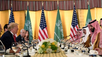 Trump praises Saudi crown prince as a 'friend,' declines say if he will discuss Khashoggi