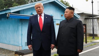 Trump, Kim meet at Demilitarized Zone, face-to-face for first time since Hanoi