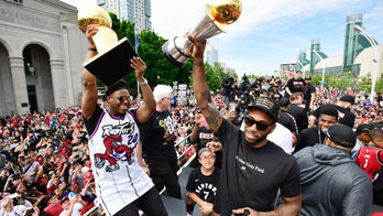 The Latest: Reports of shots fired at Raptors parade