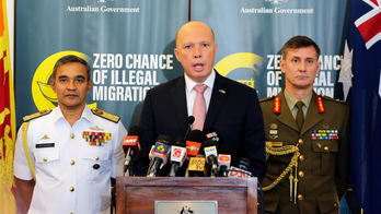 Australia emphasizes tough stance on people smuggling