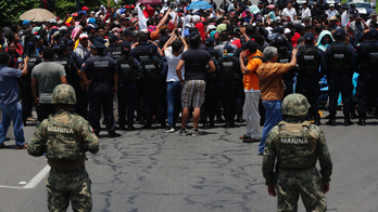 Mexico officials intercept about 1,000 migrants on highway