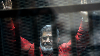The Latest: HRW says imprisoned Morsi's death 'predictable'