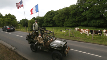 Reenactors all have their reason to mark D-Day