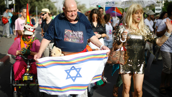 Jerusalem pride draws thousands of gay revelers and police