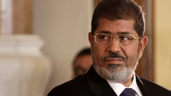 Egypt TV says ousted president Morsi dies in court