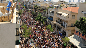 Pride parade kicks off in Tel Aviv with partyers, protesters