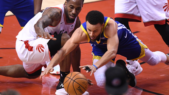 Warriors hang on to stay alive, win Game 5 of NBA Finals