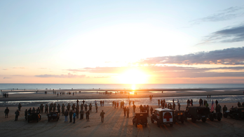 The Latest: Normandy crowds want to preserve D-Day memories