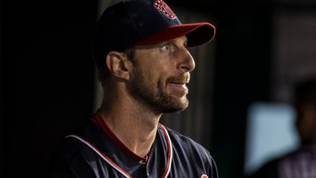 Nationals pitcher breaks nose when errant bunt hits him in the face
