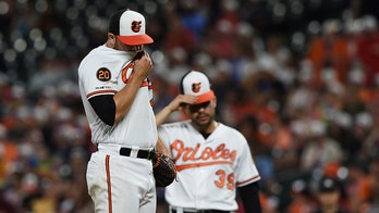 Baltimore Orioles fan grabs foul ball away from two youngsters: 'I know it's terrible'