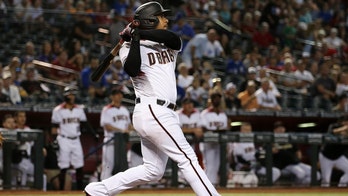 Arizona Diamondbacks' Eduardo Escobar flies to Miami before game to get sons' green cards