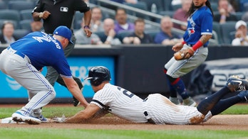 Yankees say injured Stanton likely to return in August