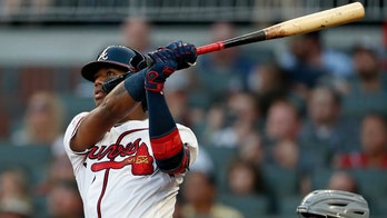 Atlanta Braves fan makes dramatic leap to catch Ronald Acuna Jr.'s grand slam