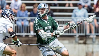 College lacrosse star trading in stick to play basketball at Northwestern