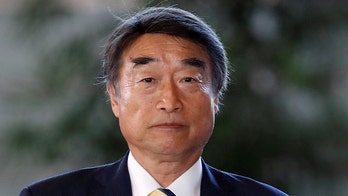 Japan's health minister insists high heels are 'necessary and appropriate' in the workplace