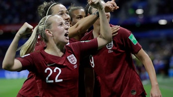 Taylor puts England in World Cup last 16 with game to spare