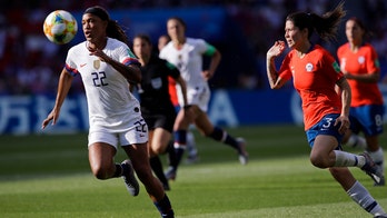 US women's soccer forward Jessica McDonald performs cool handshake with son before France match