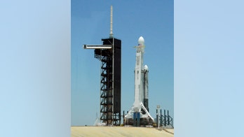 SpaceX launches hefty rocket with 24 satellites, human ashes