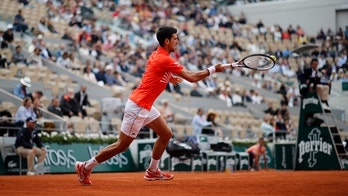 Djokovic aims to extend Slam streak at French Open