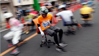 Japanese racers grab chairs to face off in office 'grand prix' competition
