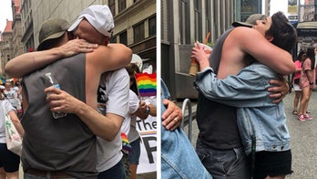 Dad goes viral for giving hundreds of hugs at Pittsburgh Pride parade