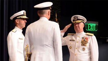 Navy probes claims war college leader kept margarita machine in office, invited students for games of Twister in his office