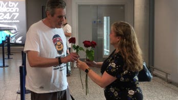 Man enlists 29 friends to help surprise wife with roses on 30th anniversary