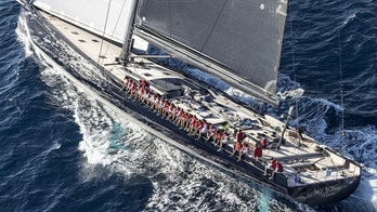 Billionaire's luxury superyacht slips from cargo ship, gets lost at sea