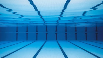 Disqualification of Alaska HS swimmer after ref saw 'butt cheek touching butt cheek' is overturned