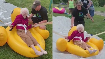 Ohio woman, 94, goes down giant slip n' slide on inflatable duck