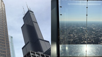 Protective layer on The Ledge at Chicago's Willis Tower cracks as visitors stand on it