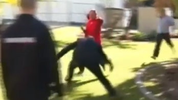 Australian detective interrupts his own news conference to rugby tackle fleeing suspect