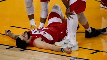 Toronto’s Fred VanVleet takes elbow from Golden State's Shaun Livingston in Game 4 of NBA Finals