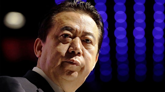 China says Interpol ex-president confesses to bribe taking, wife suspects an imposter