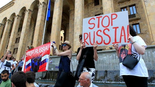 Protesters try storming Georgian Parliament over Russian lawmaker's visit