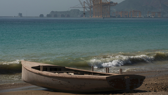 The Latest: Damaged oil tanker arrives off UAE coast