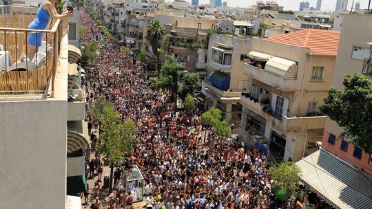 Pride parade kicks off in Tel Aviv with partyers, protesters