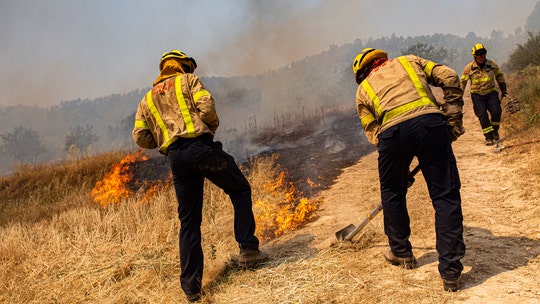 2 die, wildfire rages in Spain amid widespread heatwave