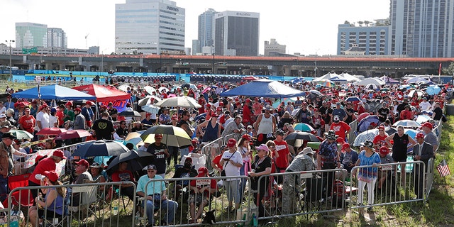 Supporters of President Trump waiting in line hours before the arena doors opened Tuesday in Orlando. (AP Photo/John Raoux)