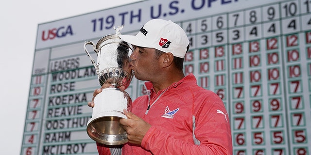 Gary Woodland poses with the trophy after winning the U.S. Open Championship golf tournament June 16, 2019, in Pebble Beach, Calif. (Associated Press)