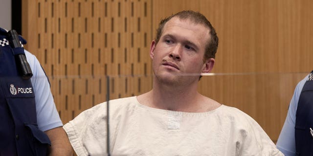 In this March 16, 2019, file photo, Brenton Tarrant, the man charged in the Christchurch mosque shootings, appears in the Christchurch District Court, in Christchurch, New Zealand. The man accused of killing 51 people at two Christchurch mosques on Friday, June 14, 2019, pleaded not guilty to all the charges filed against him.