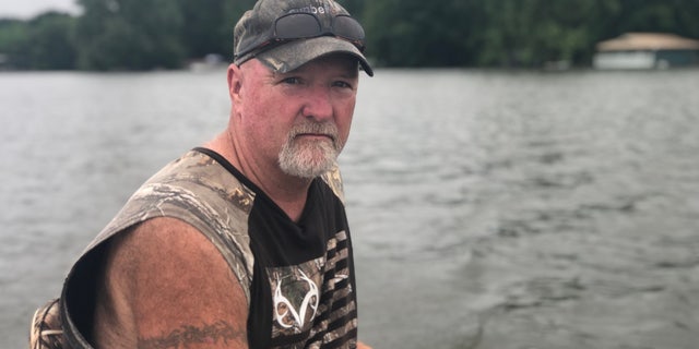 Bart Moore, a retired Pine Bluff firefighter, built his house 30 years ago with his late wife. The house is now underwater.