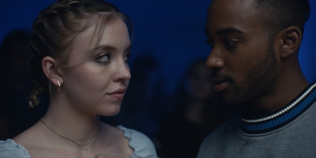 Sydney Sweeney, left, as Cassie and Algee Smith, right, as Chris.