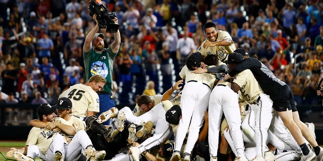 Vanderbilt players celebrate after defeating Michigan in Game 3 of the NCAA College World Series baseball finals in Omaha, Neb., Wednesday, June 26, 2019. (Associated Press)
