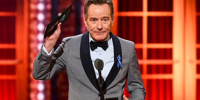 Bryan Cranston accepts the award for best performance by an actor in a leading role in a play for "Network" at the 73rd annual Tony Awards at Radio City Music Hall on Sunday, June 9, 2019, in New York.