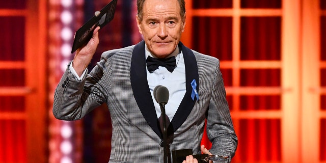 Bryan Cranston accepts the award for best performance by an actor in a leading role in a play for "Network" at the 73rd annual Tony Awards at Radio City Music Hall on Sunday, June 9, 2019, in New York. (Photo by Charles Sykes/Invision/AP)
