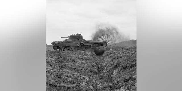 File photo -Preparations For Operation Overlord (The Normandy Landings): Sherman Crab Mark II minesweeping flail tank, one of Hobart's 'funnies', used to clear already identified minefields, 27 April 1944.