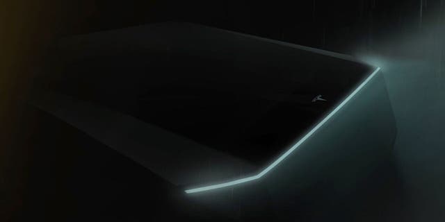 Tesla has released a single teaser image of its sci-fi truck that shows the front end.