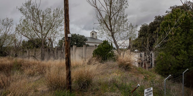 In this Friday, April 5, 2019 photo, Franco's family tomb is seen in the background in Mingorrubio's cemetery. (AP Photo/Bernat Armangue)