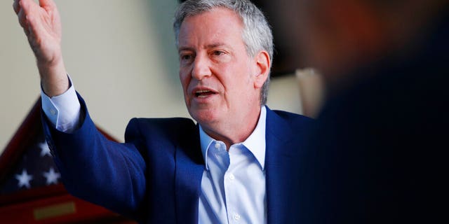 FILE: Democratic presidential candidate New York Mayor Bill de Blasio speaks at an event with veterans and military families in Las Vegas.